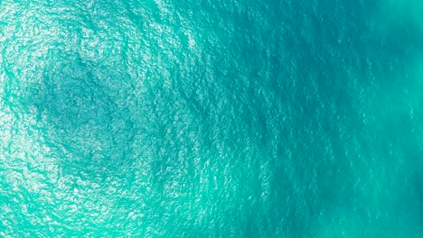 beautiful turquoise sea water with a shade from the clouds