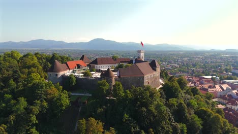 stunning drone footage of ljubljana, slovenia, showcasing the charming old town, the medieval castle, and the vibrant city center with its picturesque streets and unique architecture