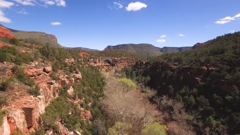 aerial flyover, rocky outcroppings, down  oak creek to midgley bridge, sedona, arizona.