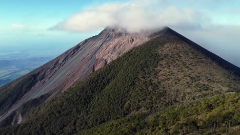 aerial view: cloud hides summit of acatenango volcano in guatemala