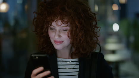 portrait-young-beautiful-red-head-business-woman-using-smartphone-browsing-online-messages-texting-on-mobile-phone-enjoying-urban-city-evening
