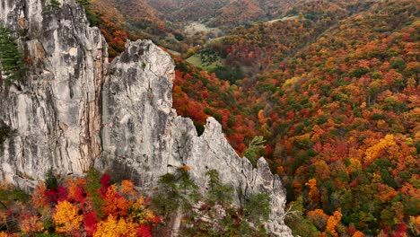 Drone-footage-of-climbers-scaling-Seneca-Rocks-in-West-Virginia-during-peak-Fall-foliage