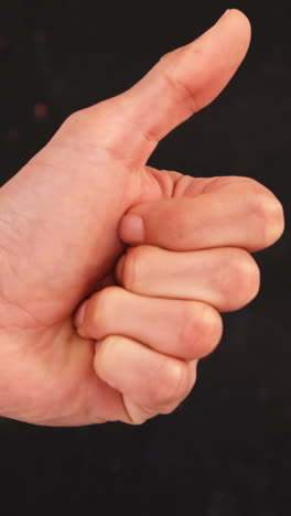 hand showing thumbs up