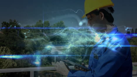 male engineer using tablet on construction platform, viewing holographic data wave overlay