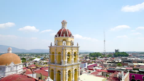 drone shot of bell tower in atlixco, mexico