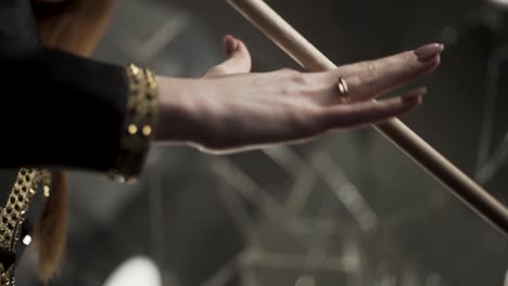 female drummer playing drums