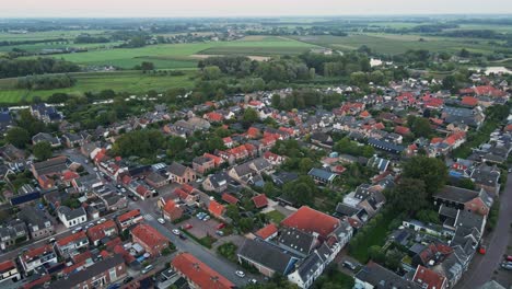 Aerial-overview-of-a-small-town-at-sunset