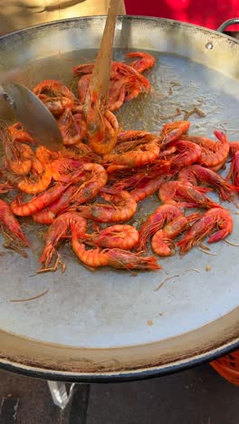 cooking shrimp paella