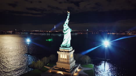 statue of liberty at night - aerial view