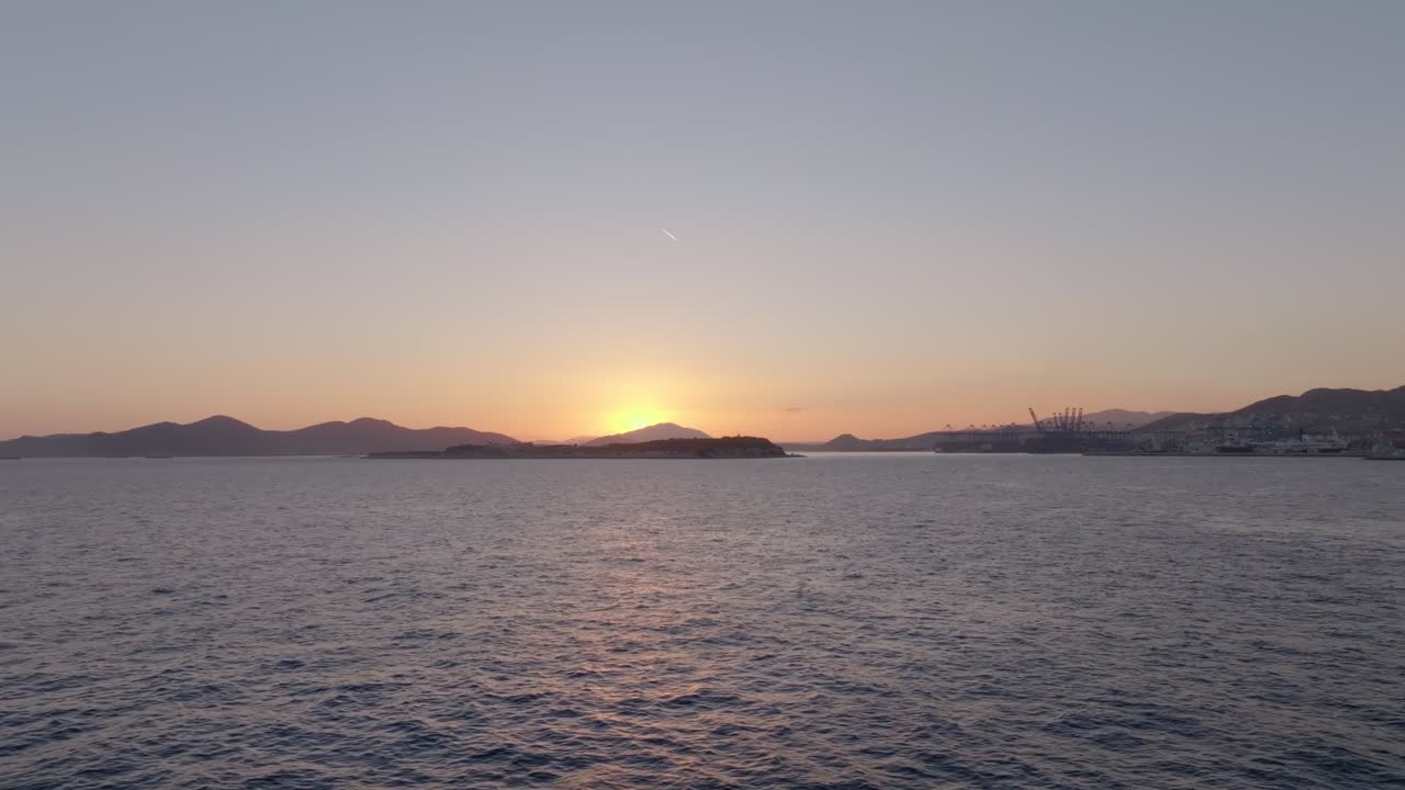 Sunset over the sea in Piraeus, Athens, Greece