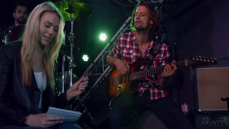 Female-musician-rehearsing-before-performing