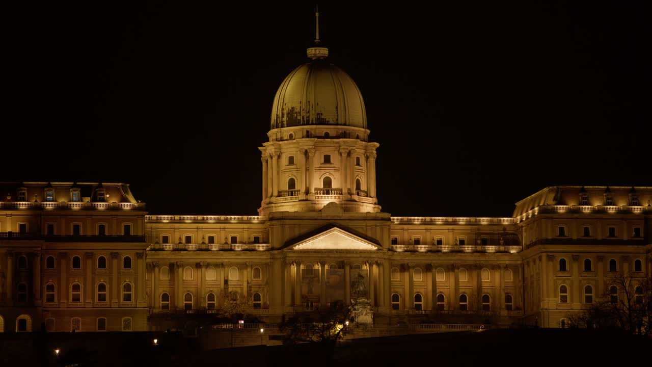 Illuminated Buda Castle (Royal Palace) At Night In Budapest, Hungary. Static Shot