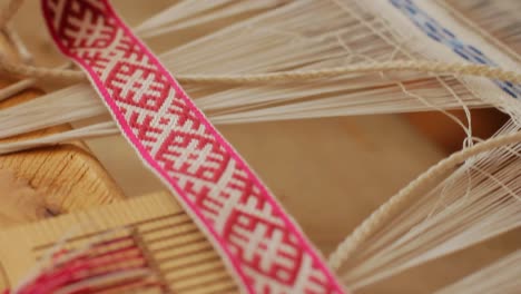 Weaving-loom-manufacturing-linen-yarn-pattern.-Weaving-machine-in-action