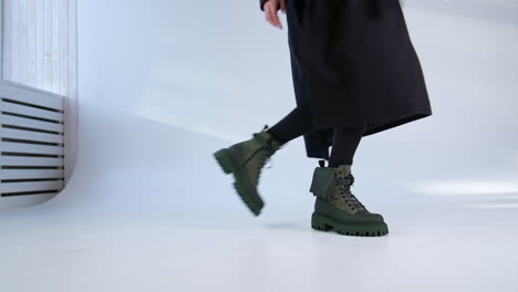 woman walking in trendy boots