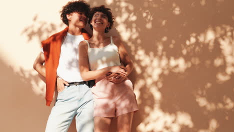 happy couple posing outdoors