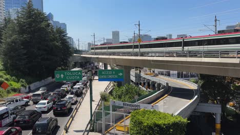 traffic jam on highway with elevated train in mexico city