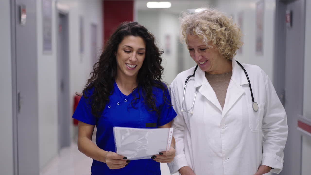 Healthcare professionals in a hospital hallway