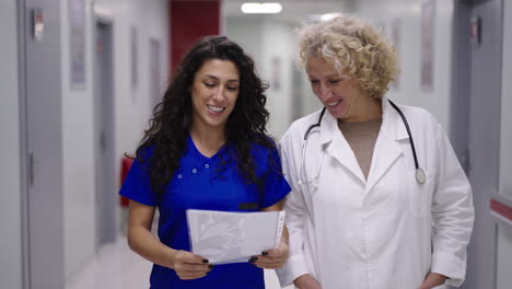 healthcare professionals in a hospital hallway