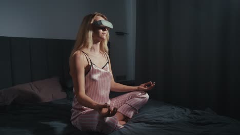 woman meditating in vr headset in bedroom