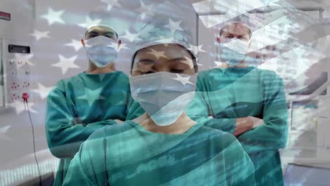 Animation-of-flag-of-usa-waving-over-surgeons-in-operating-theatre