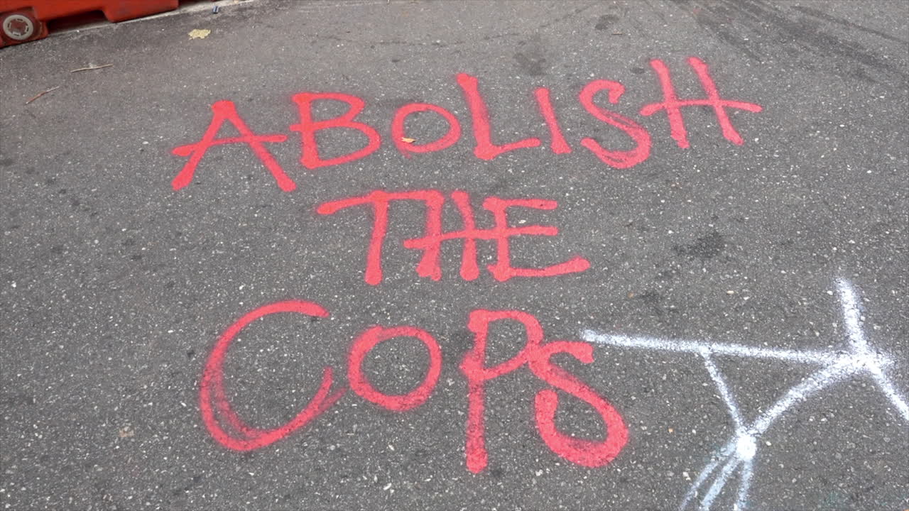 Street graffiti calls for the abolition of cops