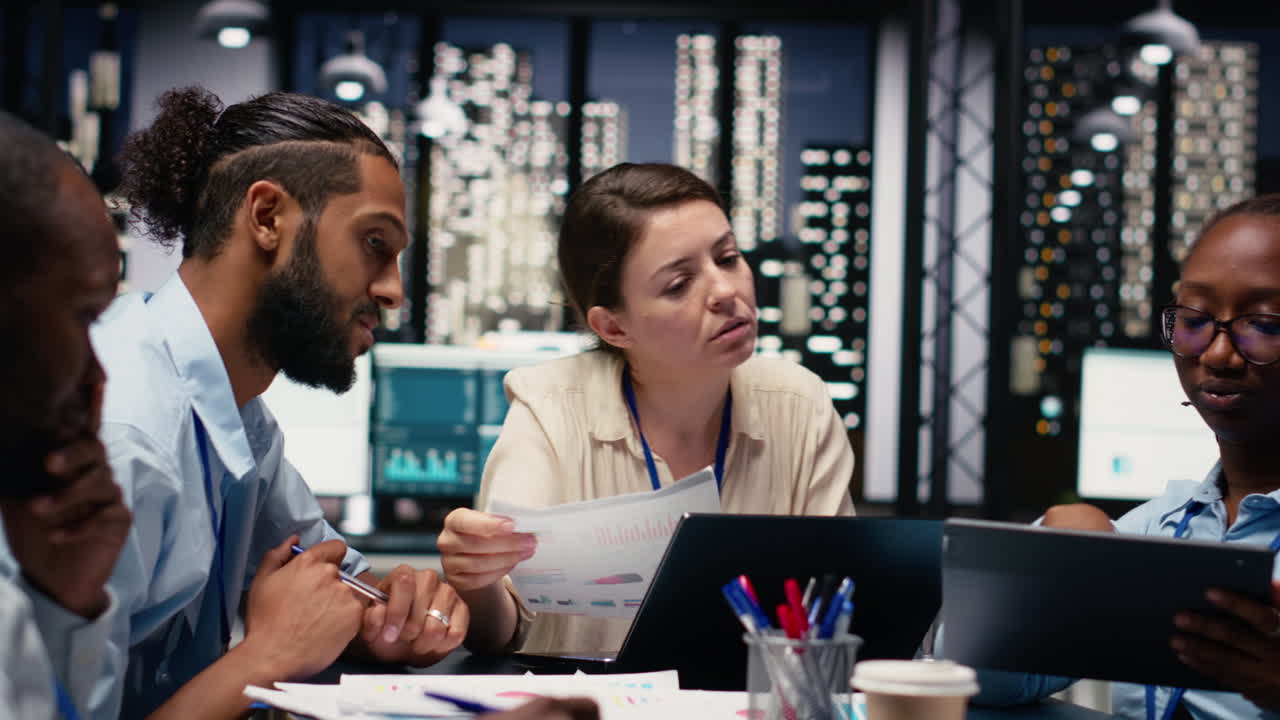 Looking over paperwork documents, diversity and team of employees
