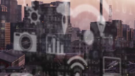 Animation-of-data-processing-and-icons-over-cityscape