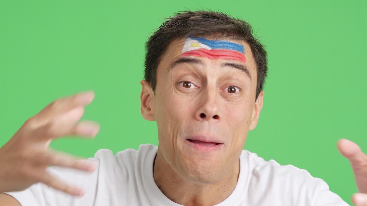 Very nervous man supporting philippine team during a difficult match