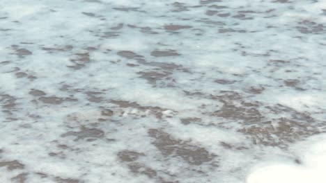 Young-Man-Writte-Heart-On-Sand-Beach