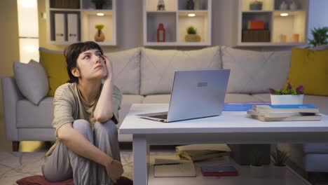 young woman with psychological problems at home at night.