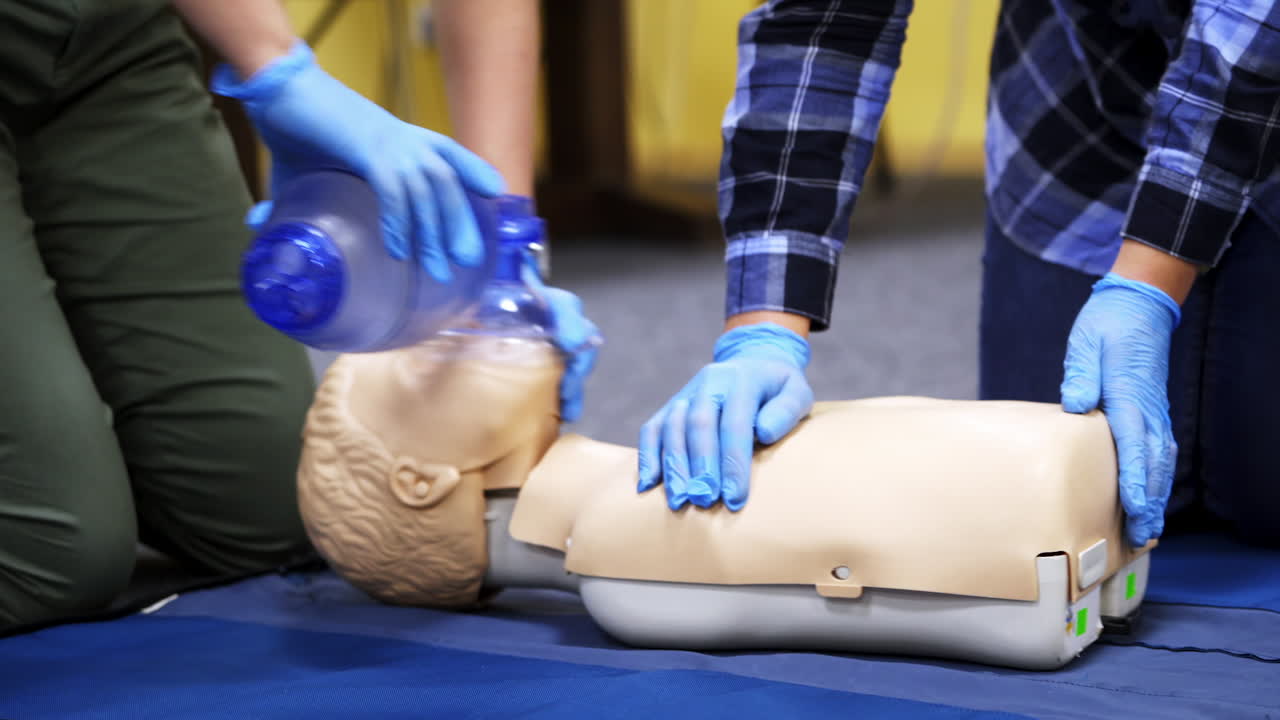 Dummies for medics used for first aid trainings. Oxigen masks on medical doll. Training for medics.