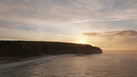 sunset over the algarve in portugal.