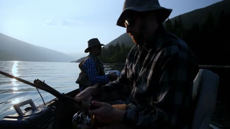 two fishermen fishing in the river 4k