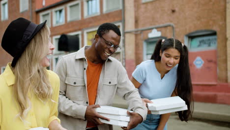 friends walking on the street with food