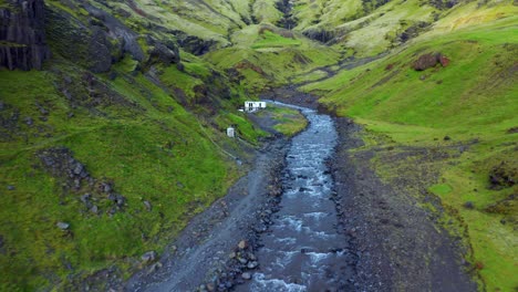 Drone-Flight-Towards-Seljavallalaug-Outdoor-Swimming-Pool-In-South-Iceland