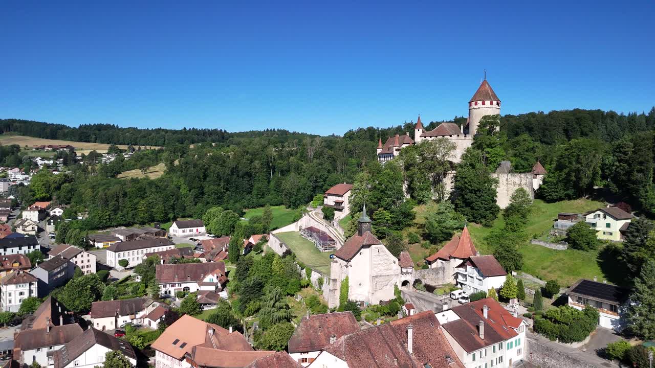 Lucens municipality Switzerland aerial drone medieval castle tower Swiss Vaud canton