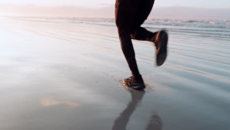 fitness, beach or legs of runner on sand in cardio