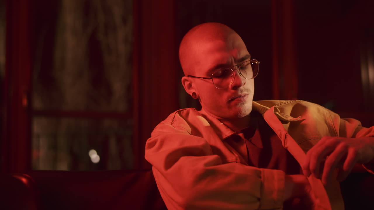 Man in Red Light at Night