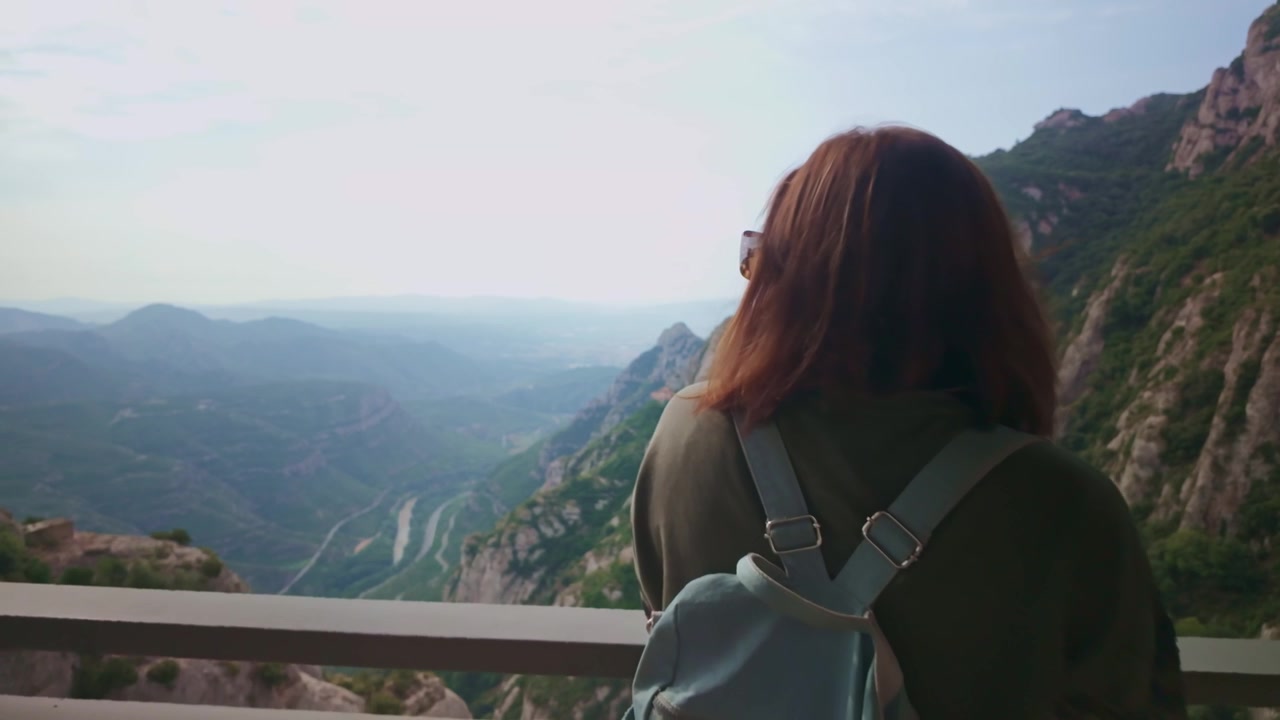 Woman admiring the beautiful Montserrat mountain view