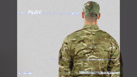 Animation of interference over soldier saluting on gray background