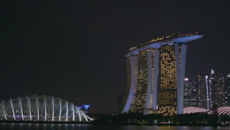 marina bay sands and gardens by the bay at night