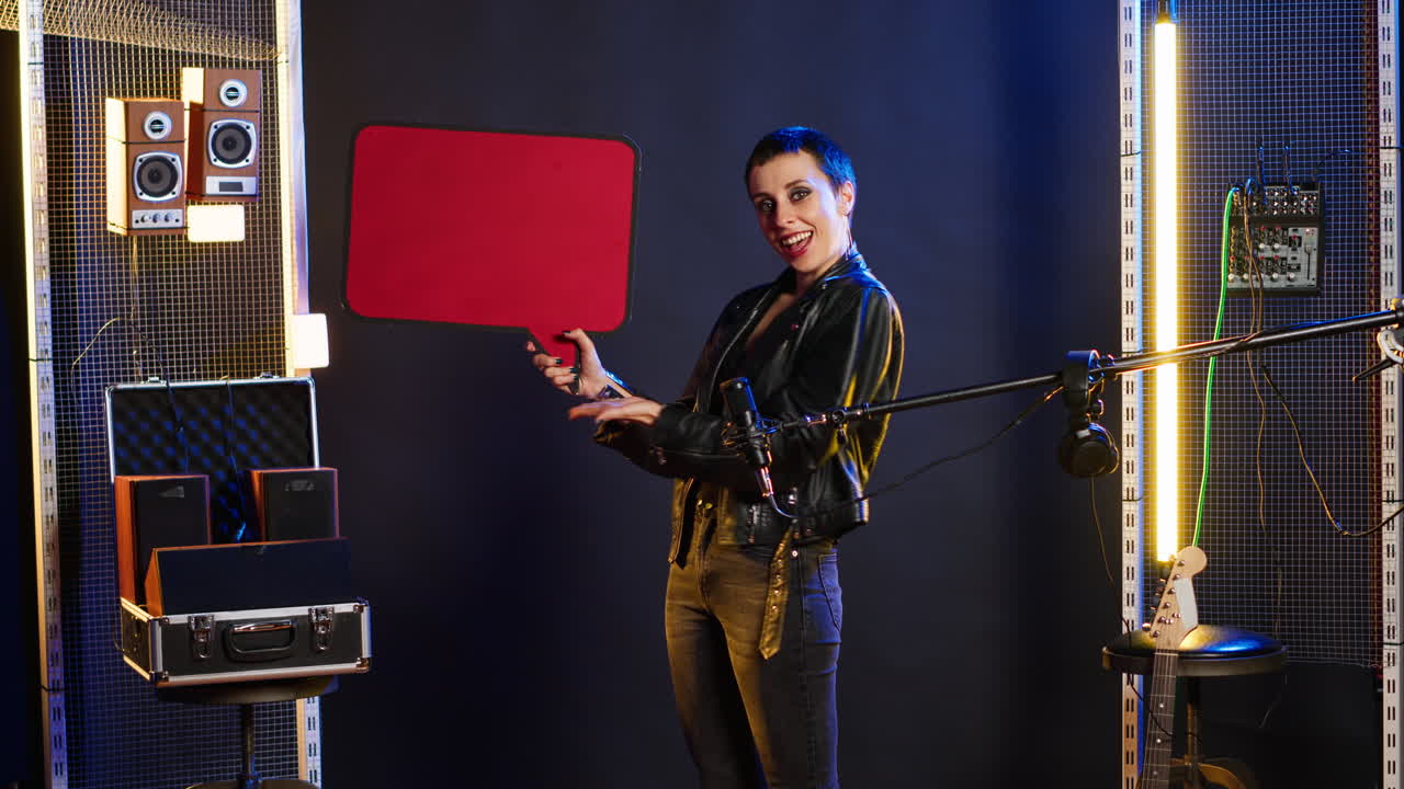 Woman Holding Message Board in Music Studio