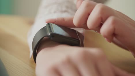 woman using a smartwatch