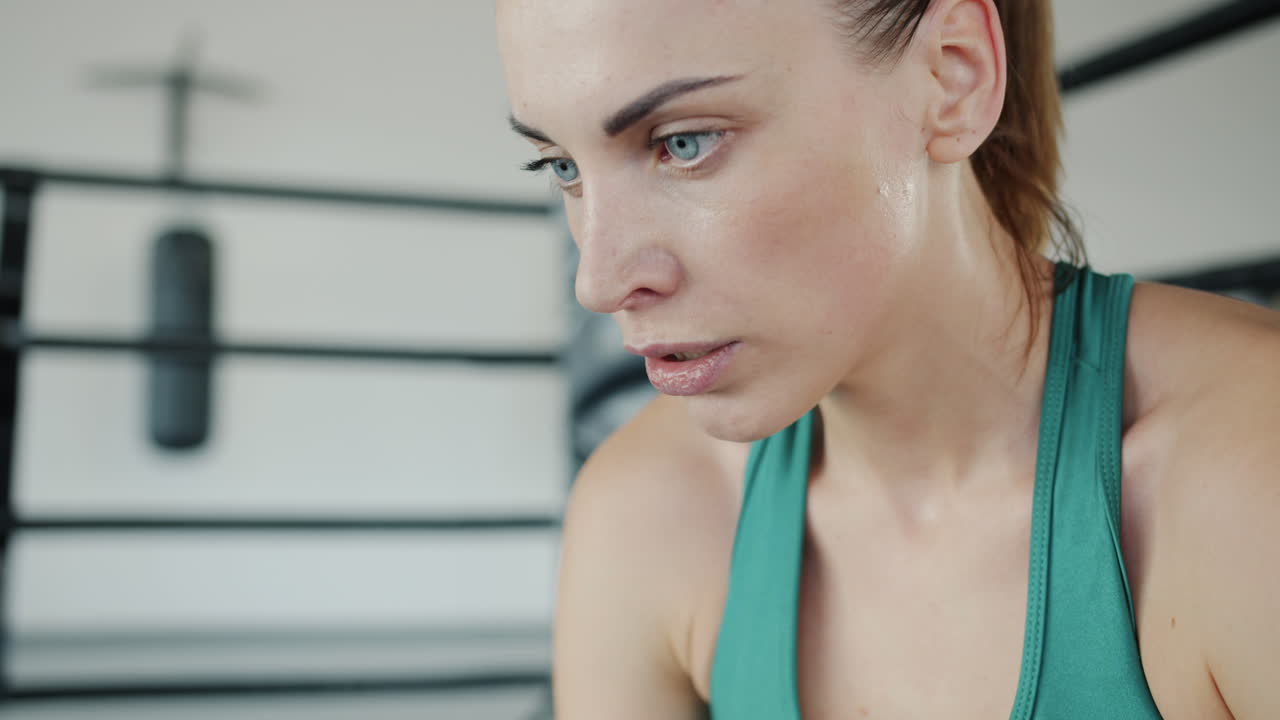 Woman taking a break after intense workout