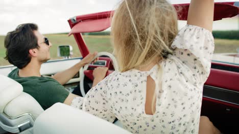 rear view video of couple driving a car