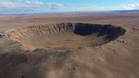 4k aerial of meteor crater or barringer crater in arizona, usa