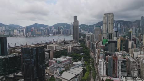 Antena-Sobre-Los-Rascacielos-De-Kowloon,-Hong-Kong,-China