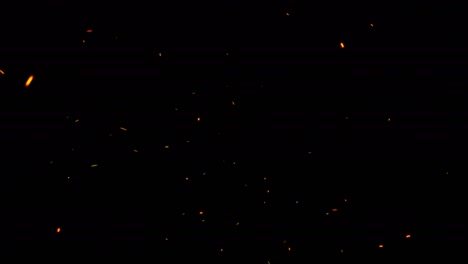 resplandor aleatorio partículas de polvo de fuego que fluyen sobre fondo negro. polvo de animación 3d en bucle sin costuras y partículas brillantes azules ardientes que vuelan para la pantalla superponen sus imágenes cinematográficas.