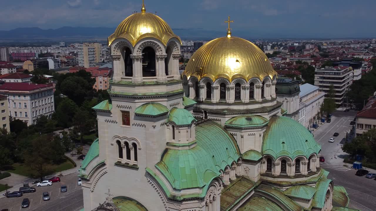 Close-up drone circling green dome and gold decorations of Alexander Nevsky Cathedral - Sofia, Bulgaria
