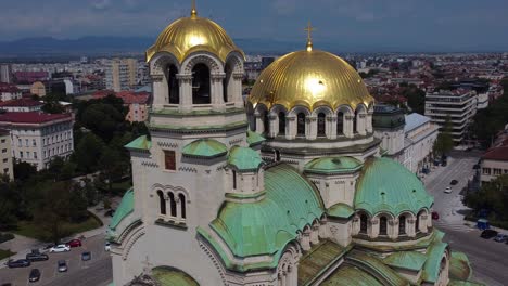 close-up drone circling green dome and gold decorations of alexander nevsky cathedral - sofia, bulgaria